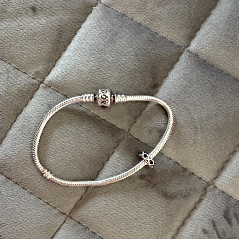 Pandora 7 inch snake chain charm bracelet with spacer.